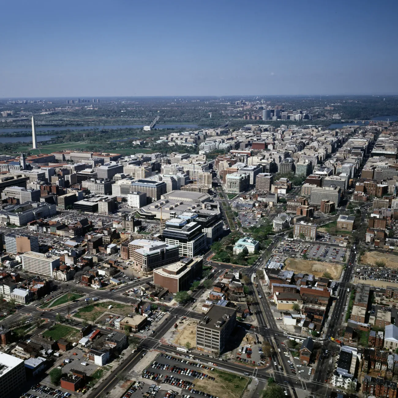 Washington, D.C. reference photograph with illustrative tracing of visible streets and roof outlines.